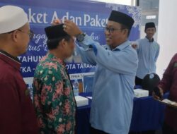 Ketua Umum DPD BKPRMI Sematkan Atribut Peserta Penataran Guru TPQ se-Kota Tarakan.